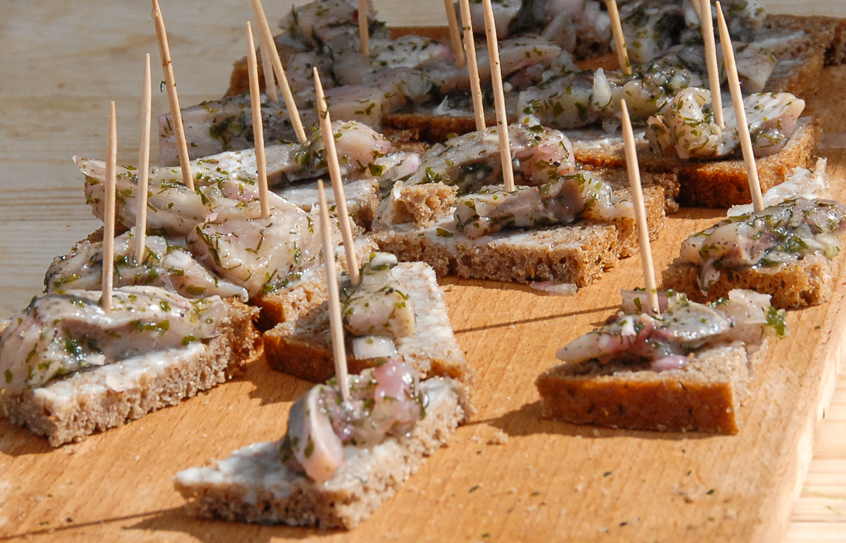 pickled herring on brown bread in Denmark