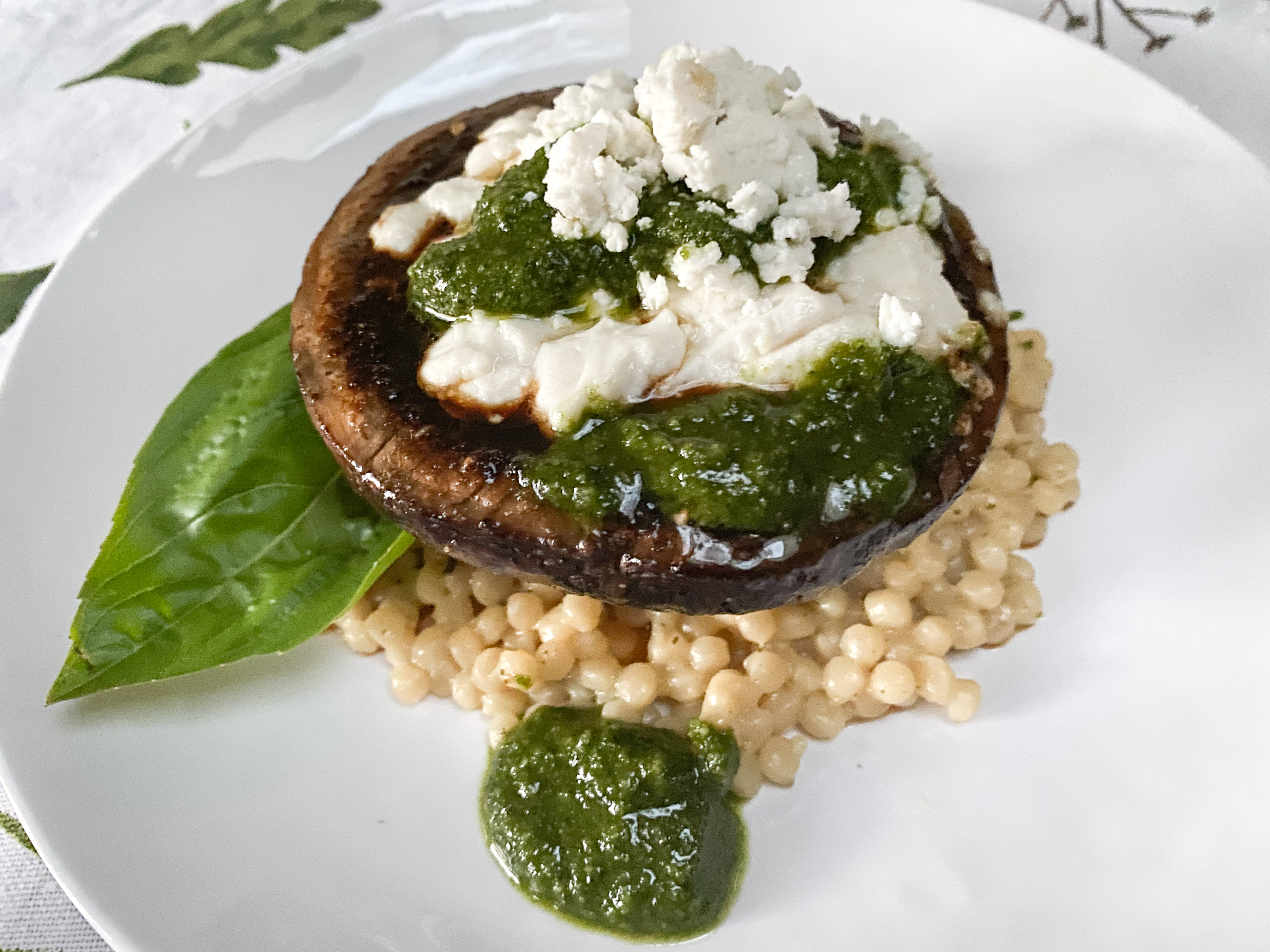 portobello mushroom with pesto and couscous