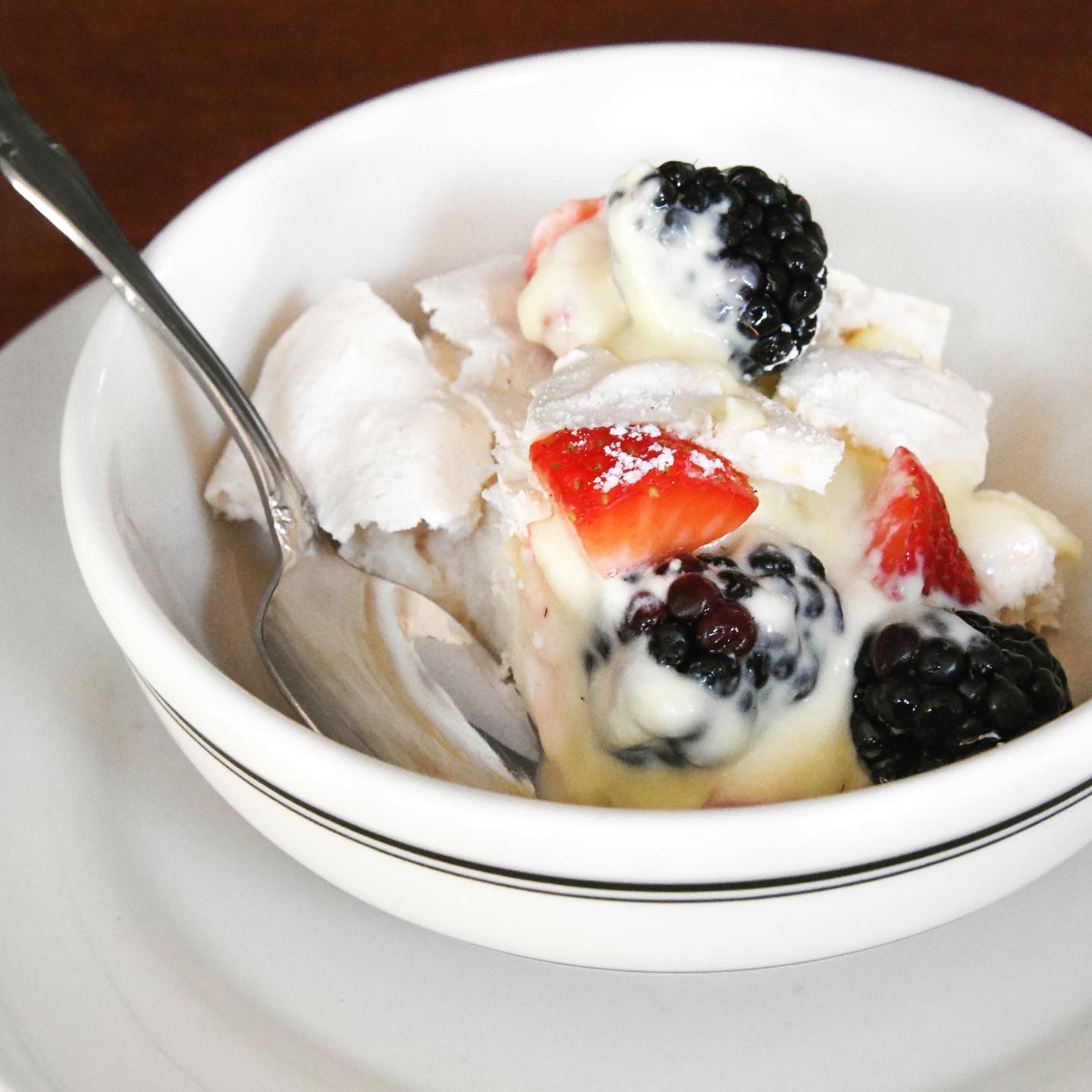 pavlova with berries and custard