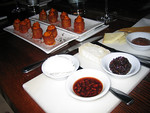 Cheese plate and patatas bravas at Amada