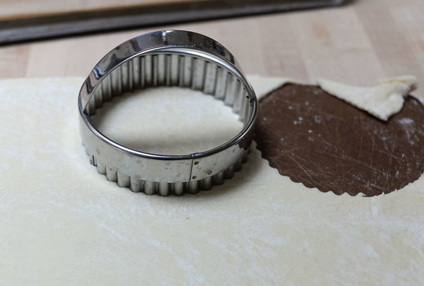 Cutting puff pastry with a 3-inch biscuit cutter