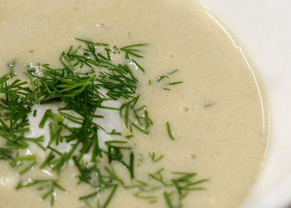 white mushrooms and sour cream make for a light colored soup