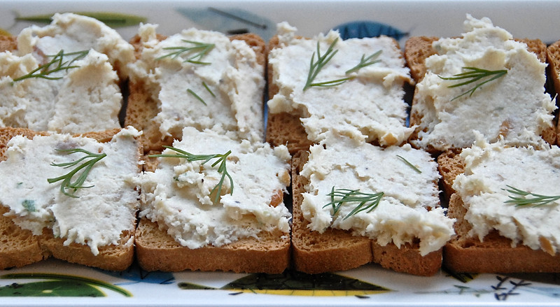 plate of smoked trout pate on crackers