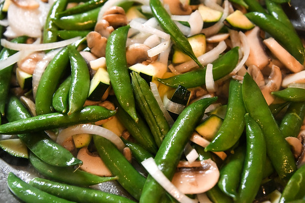 stir fried peas, mushrooms, onions