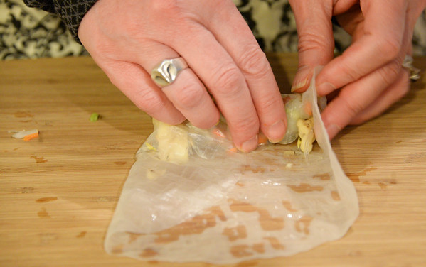 Folding the spring roll's edges