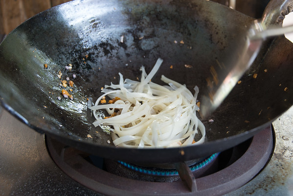 Stir-frying pad Thai