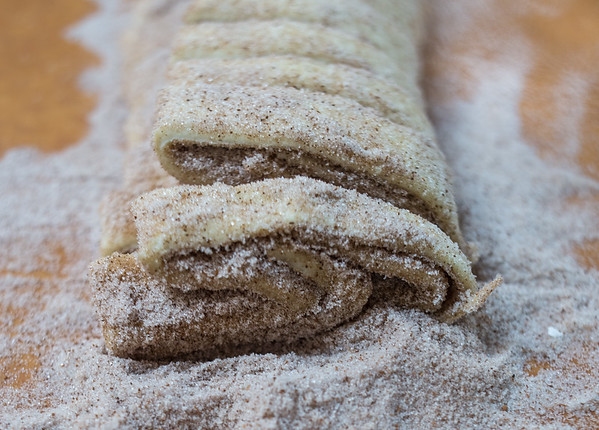 Sliced cinnamon palmier dough