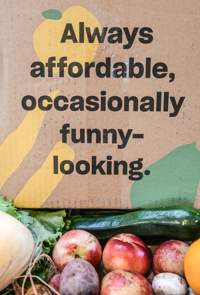vegetables, fruit and a cardboard box