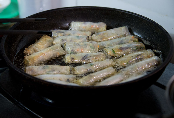 frying shrimp rolls